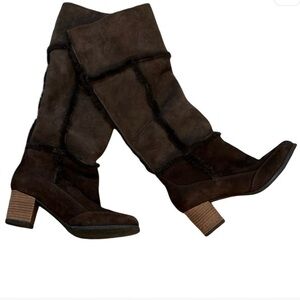 ROCKPORT genuine leather fleece lined high heeled boots. Size 6 with 2” heel.